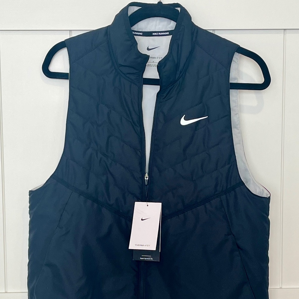 Nike Black Quilted Puffer Vest with White Swoosh